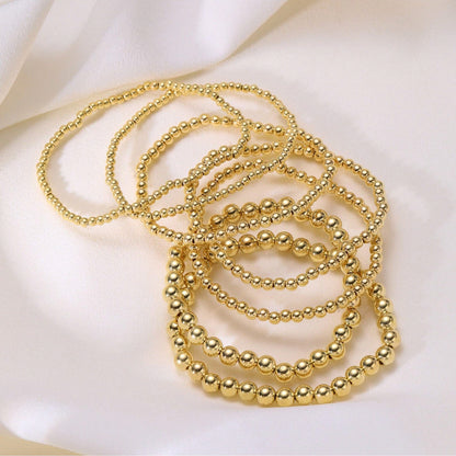 7-Piece Stackable Multifunctional Gold Bead Bracelets – Bohemian Beach Style Mix-and-Match Bead Chains, Versatile No-Outfit-Picking Design for Daily Wear, Beach Vacations & Party Gatherings